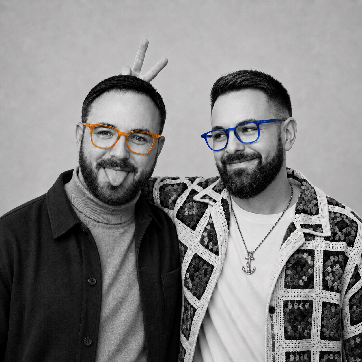 Daniel and Roy in a playful studio portrait.
